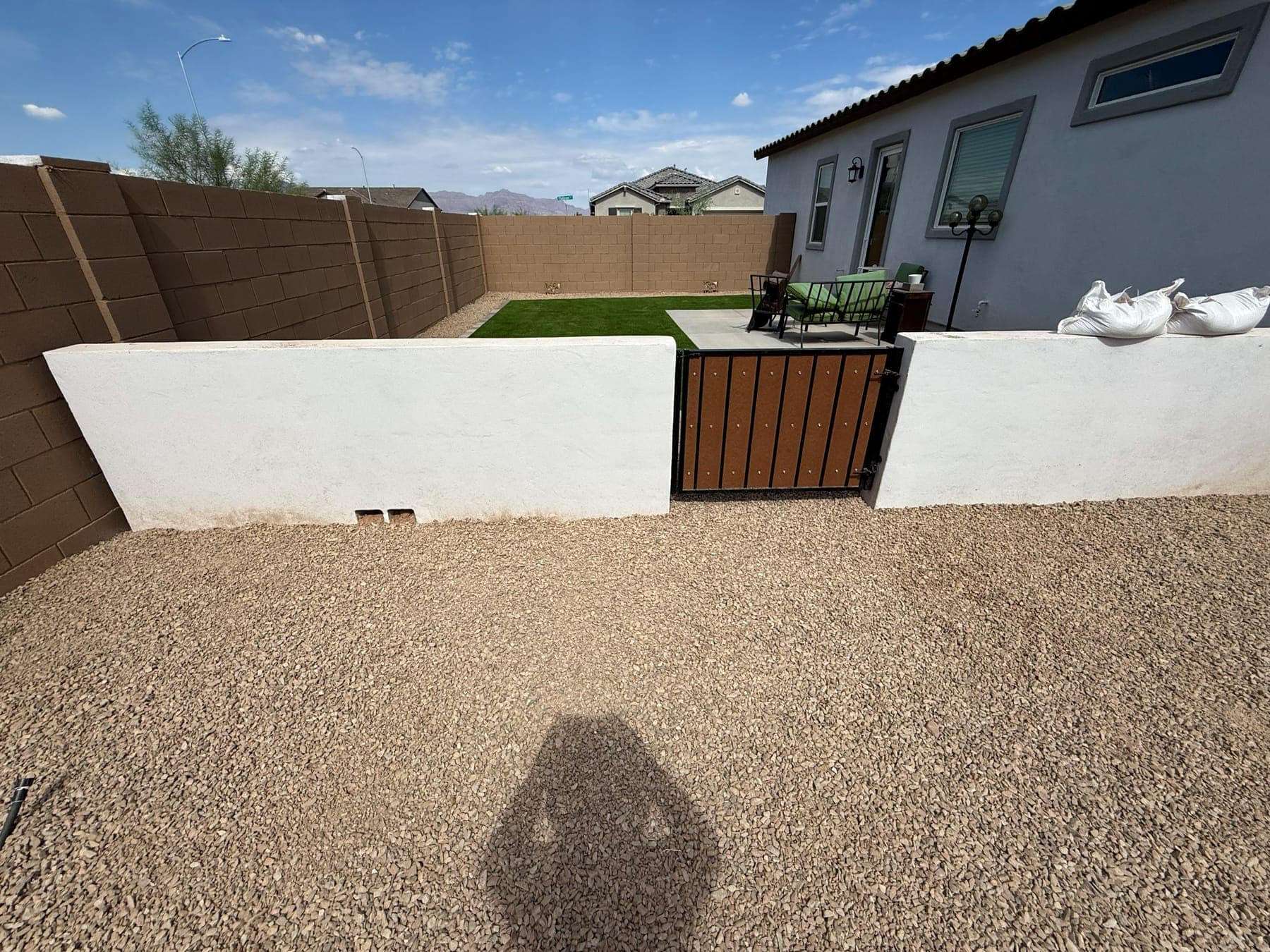 Stucco privacy wall in Arizona backyard