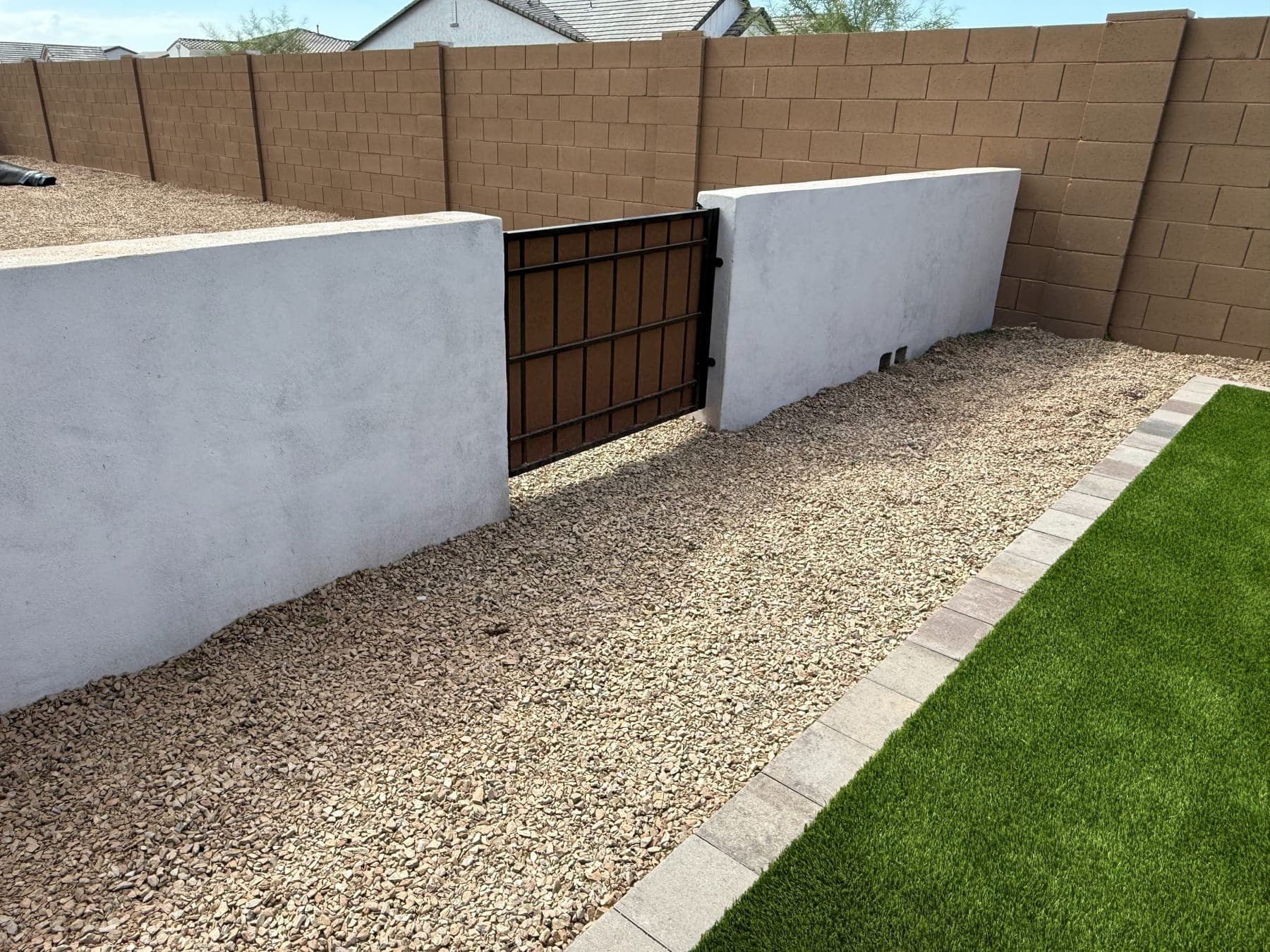 Utility screen wall with gate