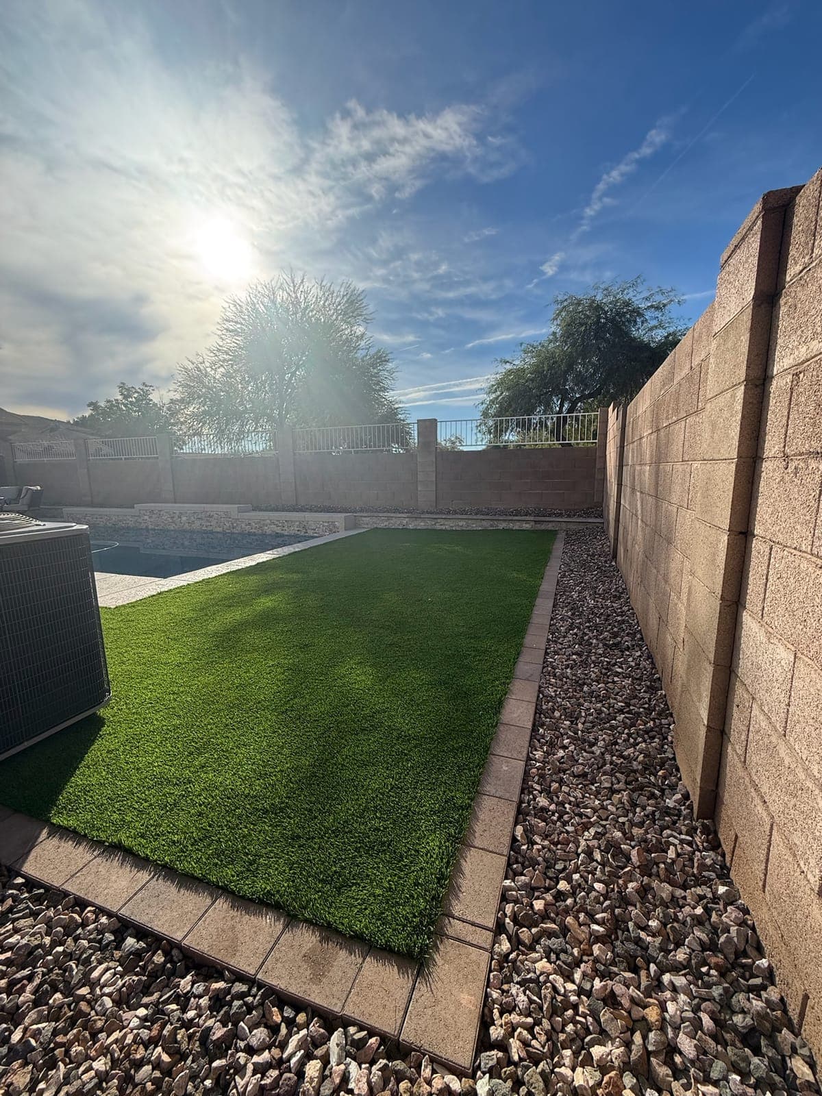 Backyard Oasis — Artificial Turf, Concrete Block Wall, Granite Gravel in the Phoenix Valley, Arizona