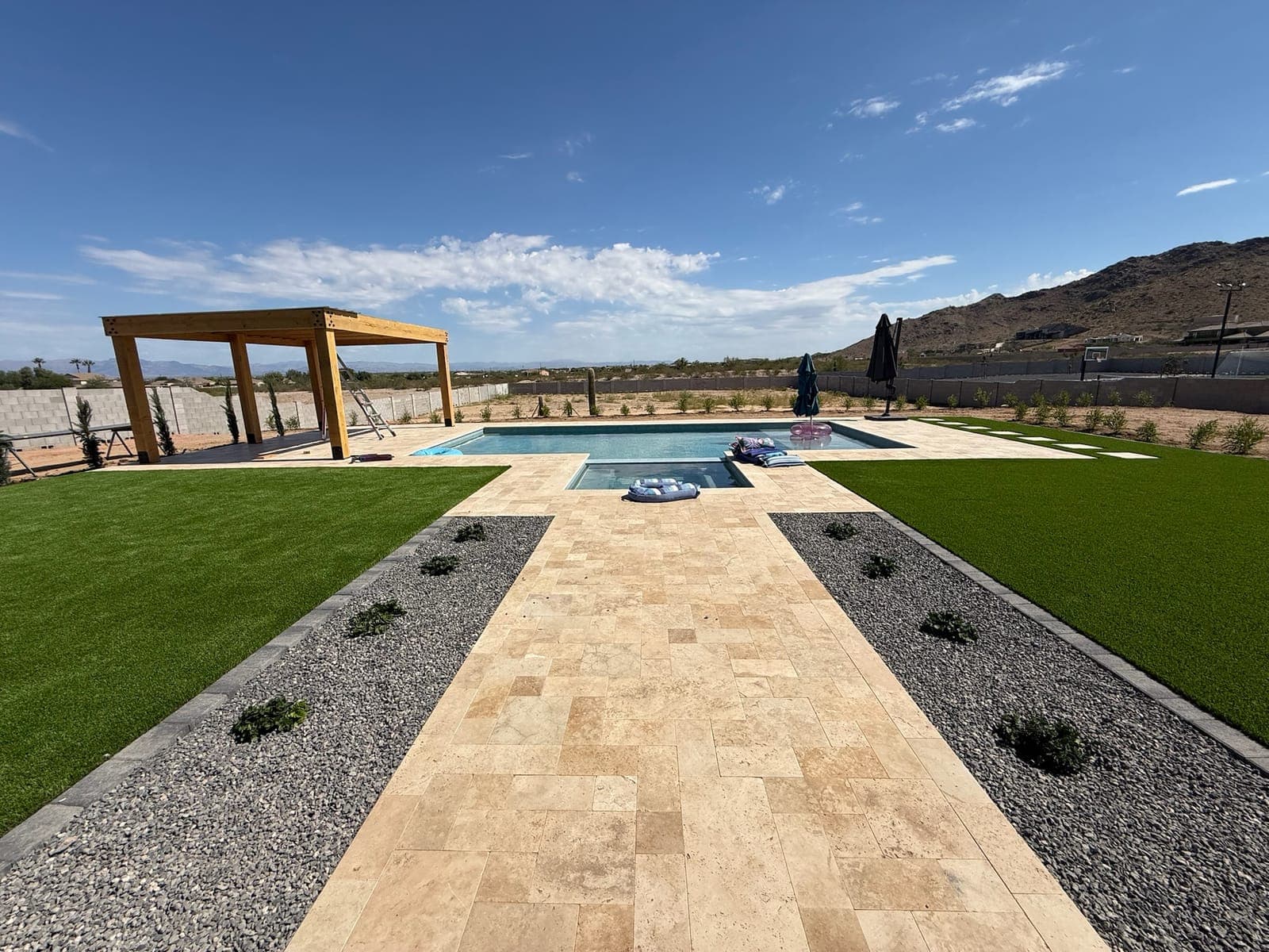 Desert Oasis — Travertine Pavers, Artificial Turf, Gravel Mulch in the Phoenix Valley, Arizona