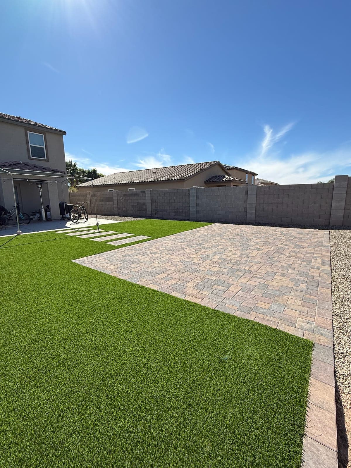 Large backyard hardscape and turf project in Queen Creek, Arizona